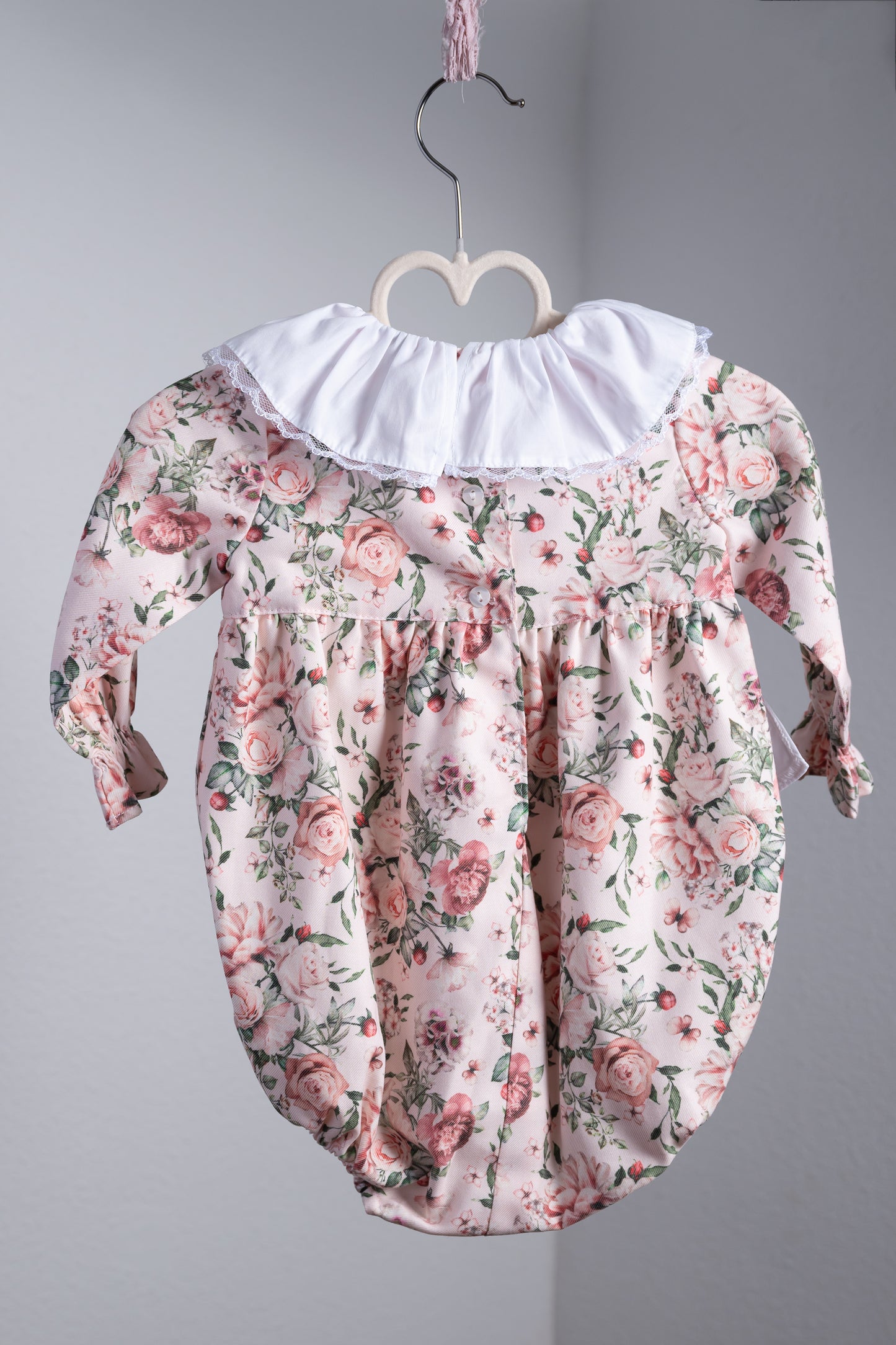 Mia bloemen romper/pakje met witte strikken