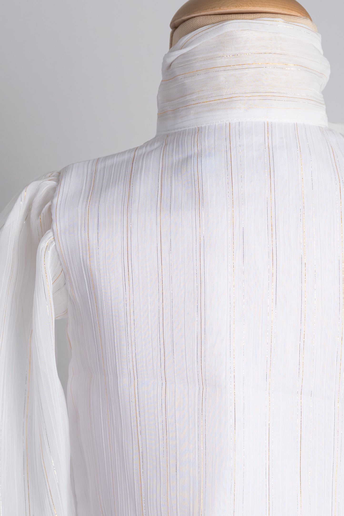Witte blouse met gouden streepjes