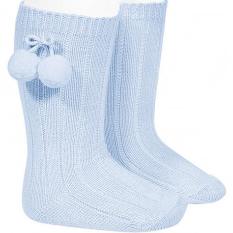 High socks with pompoms baby blue